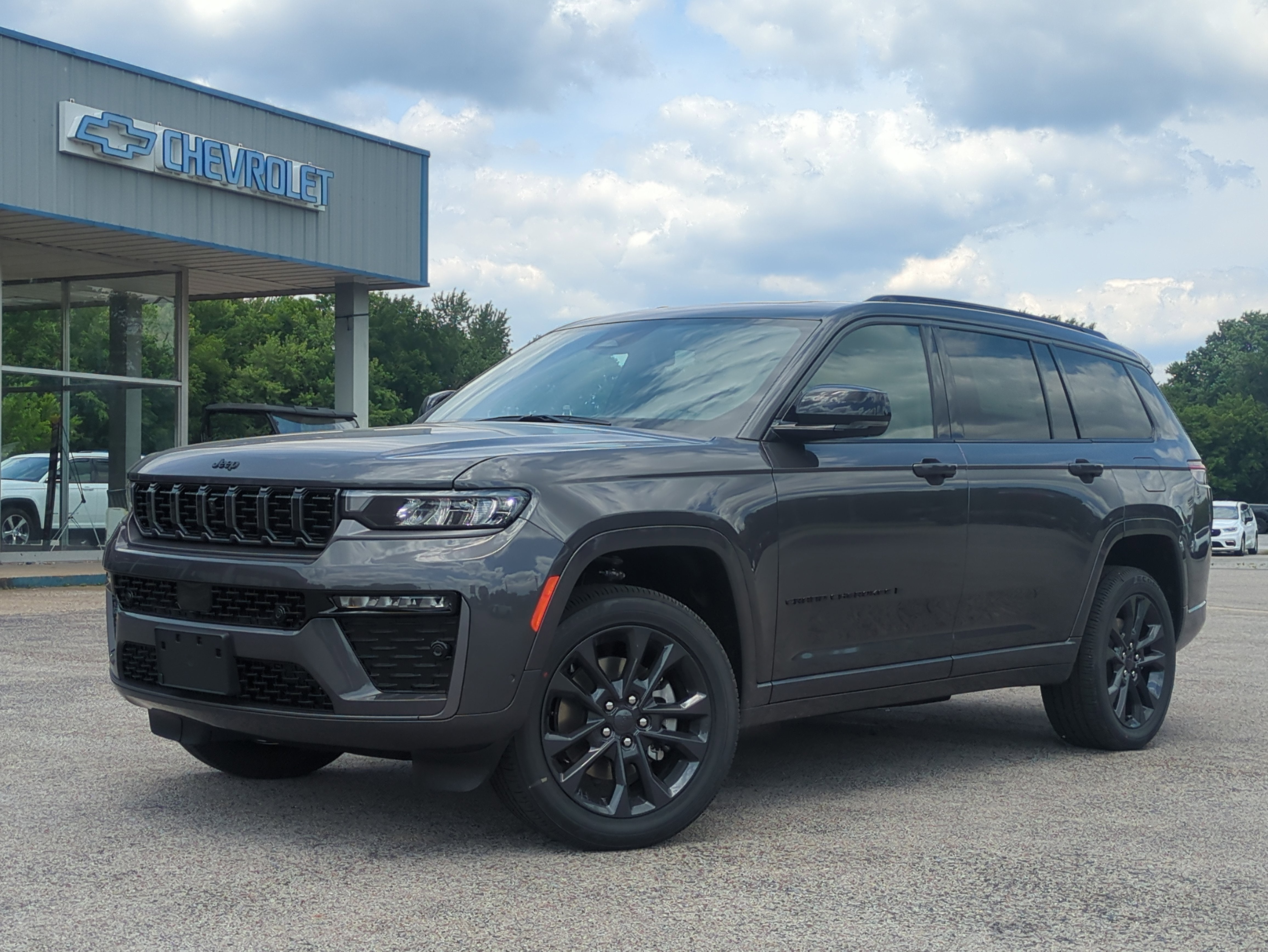 2026 Jeep Grand Cherokee GRAND CHEROKEE L LIMITED RESERVE 4X4 in Baltic Gray Metallic Clear-Coat Exterior Paint — front three-quarter view