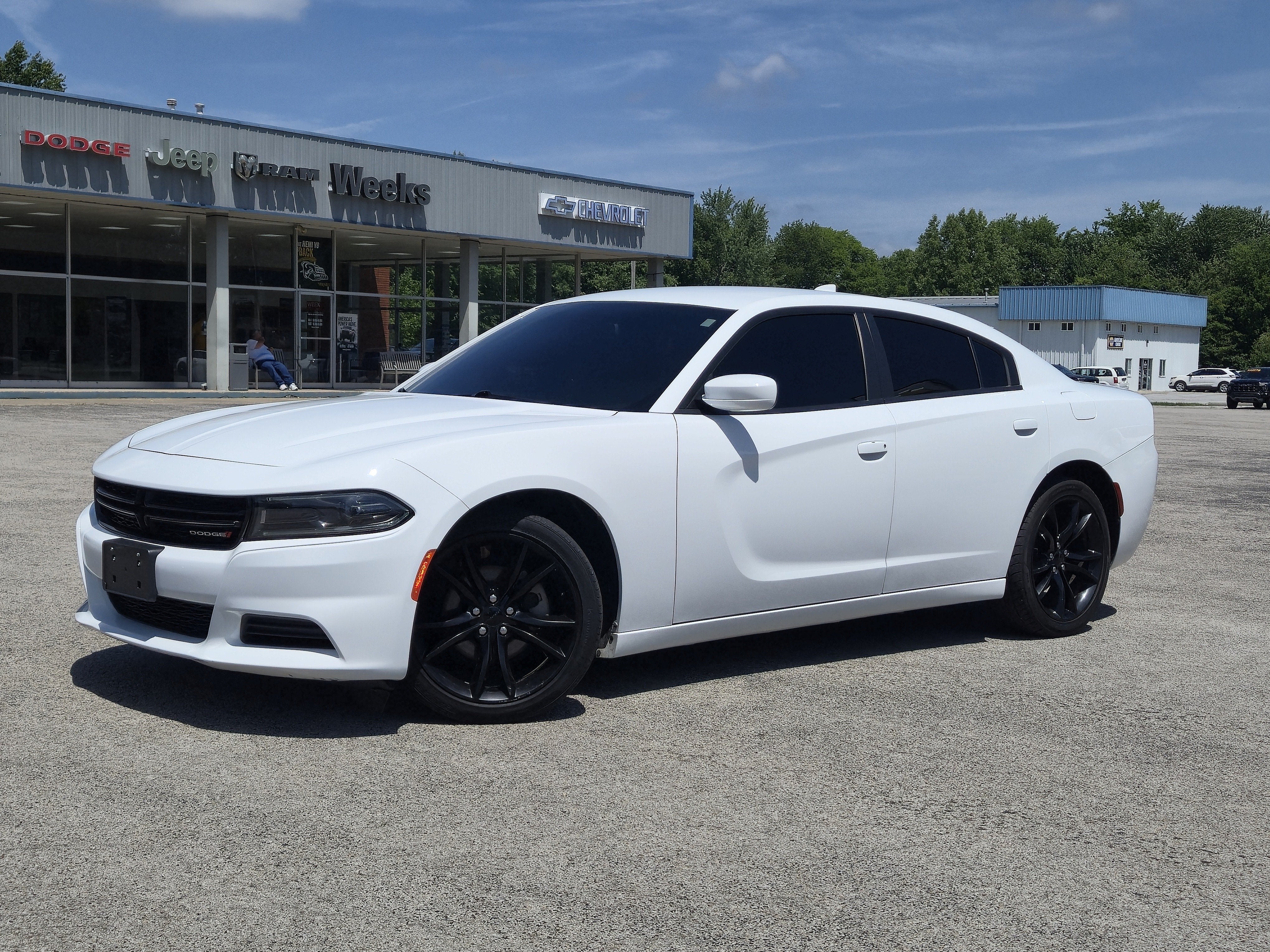 2022 Dodge Charger SXT RWD in White Knuckle Clearcoat — front three-quarter view